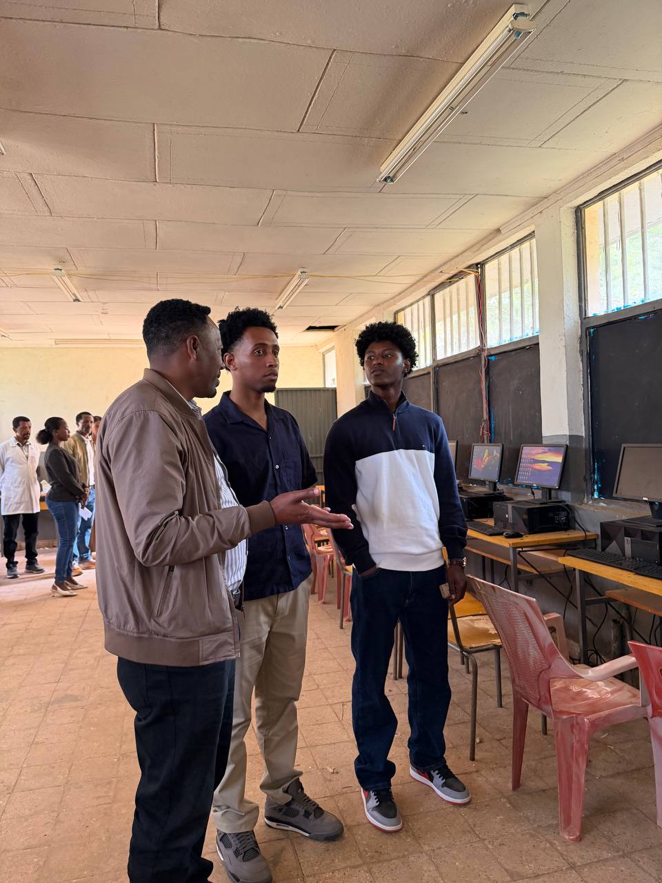 Foundation members visiting a school computer room